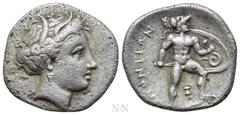 Greek Coins LOKRIS. Lokri Opuntii. Hemidrachm or Triobol (Circa 330 BC). Obv: Wreathed head of Demeter right, wearing earring. Rev: ΛΟΚΡΩΝ. Ajax advancing right, holding sword and shield; kantharos be