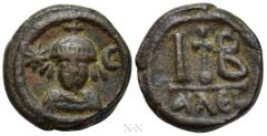 Byzantine Coins HERACLIUS (610-641). 12 Nummi. Alexandria. Obv: Draped and cuirassed bust facing, wearing crown surmounted by cross; eight-rayed star to left, crescent to right. Rev: Large IB; cross o