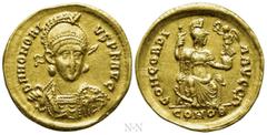 Roman Imperial Coins HONORIUS (393-423). GOLD Solidus. Constantinople. Obv: D N HONORIVS P F AVG. Diademed, helmeted and cuirassed bust facing slightly right, holding spear and shield decorated with h