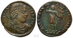 Roman Imperial Coins JOVIAN (363-364). Ae. Antioch. Obv: D N IOVIANVS P F AVG. Laurel and rosette-diademed, draped and cuirassed bust right. Rev: VICTORIA ROMANORVM / ANTΓ. Jovian standing facing, hea