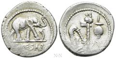 Roman Republican Coins JULIUS CAESAR. Denarius (49 BC). Military mint traveling with Caesar. Obv: CAESAR. Elephant advancing right, trampling upon horned serpent. Rev: Emblems of the pontificate: simp