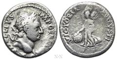 Roman Imperial Coins VITELLIUS (69). Denarius. Lugdunum. Obv: A VITELLIVS IMP GERMAN. Laureate head right, with globus at point of neck. Rev: VICTORIA AVGVSTI. Victory advancing left, holding palm fro