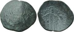 LATIN RULERS OF CONSTANTINOPLE. Small module trachy. Constantinople. Obv: IC - XC. Bust of Christ facing, beardless and nimbate. Rev: MANOVHΛ ΔECΠOTHC. Full-length figure of emperor facing, wearing st