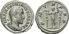 MAXIMINUS THRAX (235-238). Denarius. Rome. Obv: IMP MAXIMINVS PIVS AVG. Laureate, draped and cuirassed bust right. Rev: P M TR P P P. Emperor in military dress standing left between two standards, rai