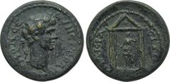 LYDIA. Nacrasa. Trajan (98-117). Ae. Obv: AYT NEP TPAIANON CE. Laureate head right. Rev: NAKPACITΩN. Artemis standing facing, head left, within tetrastyle temple, holding bow and drawing arrow from qu