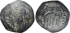 LATIN RULERS OF CONSTANTINOPLE. Trachy. Uncertain mint. Obv: IC - XC. Christ Pantokrator seated facing. Rev: MANOVHΛ ΔECΠOTHC. Emperor standing facing with sword and globus cruciger. Sear 2045. Condit