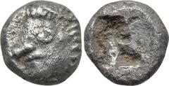 IONIA. Kolophon. Obol (6th century BC). Obv: Archaic head of Apollo left. Rev: Incuse square punch. BMC -; Isegrim -; SNG von Aulock - (cf. 1808 ff.; Hemiobol); cf. SNG Kayhan 342 (Hemiobol). Conditio