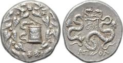 LYDIA. Apollonis. Cistophor. In the name of Eumenes III Aristonikos. Dated year 3 (132/1 BC). Obv: Cista mystica with serpent; all within ivy wreath. Rev: AΠOΛ BA EY Γ. Bow case between wo serpents. C