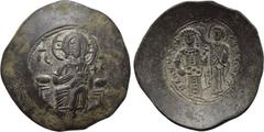 MANUEL I COMNENUS (1143-1180). Trachy. Constantinople. Obv: IC - XC. Christ Pantokrator entrhoned facing. Rev: MANYHΛ ΔECΠOT. Manuel standing facing, holding labarum and globus cruciger, being crowned