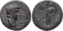 LYDIA. Sardes. Nero (54-68). Ae. Mindius, magistrate. Obv: NEPΩN KAIΣAP. Laureate head right. Rev: EΠΙ MINΔIOY ΣAPΔIANΩN. Dionysus standing left, holding thyrsus and pouring wine out of cantharus; thr