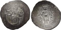 JOHN II COMNENUS (1118-1143). BI Aspron Trachy. Thessalonica. Obv: MP - ΘV. Virgin Mary seated facing on throne, holding Christ medallion on breast. Rev: Iω / ΔЄC / ΠΟT / Tω / ΠOP - ΦV / PO / ΓЄ / NH 