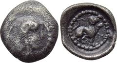 LYCIA. Tios. Uncertain Dynast (Circa 400 BC). Hemiobol. Obv: Helmeted head of Athena right. Rev: Panther sitting right, head facing, raising forepaw. Hirsch 205, lot 397; Gorny & Mosch 115, lot 1194. 