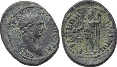 LYDIA. Gordus Julia. Trajan (98-117). Ae. Obv: AYT KA NE TPAIANON CEB ΓEP ΔAKIK. Laureate head right. Rev: IOYΛIEΩN ΓOPΔHNΩN. Mên standing facing, head left, wearing Phrygian cap, holding patera and l