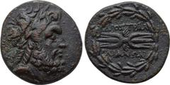 LYDIA. Tralleis. Ae (2nd-1st centuries BC). Obv: Laureate bust of Zeus right. Rev: ΔΙΟΣ ΤΡΑΛ / ΛΙΑΝΩΝ. Winged thunderbolt between legend; all within wreath. SNG Kayhan 1010; SNG von Aulock -. Conditio