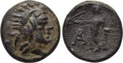 LYCIA. Arykanda. Ae (2nd century BC). Obv: Radiate head of Sozon(?) right. Rev: Apollo standing left, holding bow and resting elbow on column to right; monogram to left. SNG Copenhagen 47-9; SNG von A