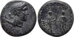 LYDIA. Magnesia ad Sipylum. Ae (2nd-1st centuries BC). Obv: Diademed head of Artemis right, with bow and quiver over shoulder. Rev: ΣΙΠΥΛΟΥ. Two male figures standing facing one another, holding scept