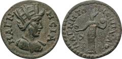 LYDIA. Magnesia ad Sipylum. Pseudo-autonomous (3rd century). Ae. Obv: MAΓNHCIA. Turreted and draped bust of Tyche right. Rev: MAΓNHTΩN CIΠVΛO. Cybele standing left, holding patera and tympanum; lion t