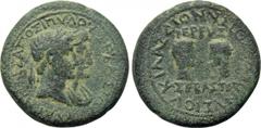LYDIA. Magnesia ad Sipylum. Augustus with Livia, Gaius and Lucius (27 BC-14 AD). Ae. Obv: ΜΑΓΝΗΤΕΣ ΑΠΟ ΣΙΠVΛΟV ΣΕΒΑΣΤΟΙ. Jugate heads of Augustus, laureate, and Livia, draped, right. Rev: ΔΙΟΝVΣΙΟΣ ΔΙ
