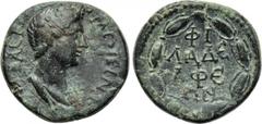 LYDIA. Philadelphia. Plotina (Augusta, 105-123). Ae. Obv: ΠΛΩΤЄΙΝΑ СЄΒΑСΤΗ. Draped bust right. Rev: ΦΙ / ΛΑΔЄ / ΛΦЄ / ΩΝ. Legend in four lines. RPC III 2384; SNG Copenhagen 382; BMC 68-70. Condition: 