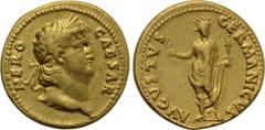 NERO (54-68). GOLD Aureus. Rome. Obv: NERO CAESAR. Laureate head right. Rev: AVGVSTVS GERMANICVS. Nero's Colossus: Facing statue of Nero, radiate, with branch and victoriola. RIC² 46; Calicó 402. Cond