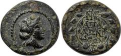 LYDIA. Apollonis. Ae (2nd-1st centuries BC). Obv: Youthful head of Dionysos right, wearing ivy wreath. Rev: ΑΠΟΛ / ΛΩΝΙ / ΔΕΩΝ. Legend in three lines; monogram above and below; all within wreath. SNG 