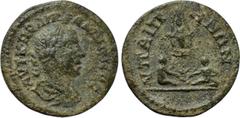 LYDIA. Hypaepa. Gallienus (253-268). Ae. Obv: AVT K ΠO ΛIK ΓAΛΛIHNOC. Laureate, draped and cuirassed bust right. Rev: VΠAIΠHNΩN. Two children seated facing one another, casting astragaloi; above, faci