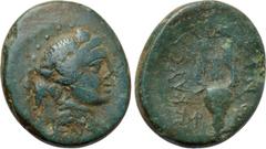 LYDIA. Kaystrianoi. Ae (2nd-1st centuries BC). Obv: Head of Dionysos right, wearing ivy wreath. Rev: ΚΑΥCΤΡΙΑΝΩΝ. Lyre, with base terminating in boukranion; monogram to left and right. Cf. SNG von Aul