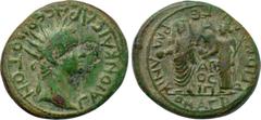 LYDIA. Magnesia ad Sipylum. Caligula with Germanicus & Agrippina I (37-41). Ae. Obv: ΓAION KAICAPA CЄBACTON. Radiate head right. Rev: ΓЄPMANIKON KAI AΓPIΠΠINAN / MA AΠO CIΠ. Germanicus, holding patera