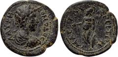 LYDIA. Mastaura. Commodus (177-192). Ae. Obv: Λ AVPH KOMOΔOC. Laureate, draped and cuirassed bust right. Rev: MACTAVPЄITΩN. Athena standing left, holding patera and resting hand upon shield; behind, s