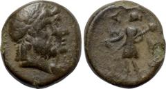 LYDIA. Nysa. Ae (1st century BC). Obv: Jugate laureate head of Hades and head of Kore, wearing grain wreath, right. Rev: NV / ΣA. Dionysos standing left, holding thyrsos and kantharos. SNG von Aulock 
