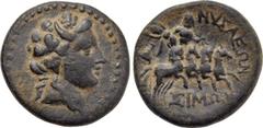 LYDIA. Nysa. Ae (1st century BC). Simon, magistrate. Obv: Head of Dionysos right, wearing ivy wreath. Rev: NV?AE?N / ?????. Hades in galloping quadriga right, carrying off struggling Persephone. SNG v