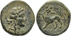 LYDIA. Sardes. Ae (Circa 2nd-1st centuries BC). Obv: Head of Dionysos right, wearing ivy wreath. Rev: ????? / A???. Horned panther standing left, head facing, holding broken spear in jaws; monogram be
