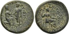 LYDIA. Sardis. Tiberius with Livia (14-37). Ae. Ioulios Kleon and Memnon, magistrates. Obv: ???????? ????????? ????????N. Tiberius standing left, raising up kneeling Tyche of Sardis to left. Rev: ????