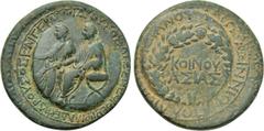 LYDIA. Sardis. Germanicus and Drusus (Died 19 and 23, respectively). Ae. Restruck by Asinios Pollio, proconsul. Obv: ??????? ??? ?????????? ???????? ???? ???? ??????????. Germanicus and Drusus seated 