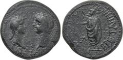 LYDIA. Tralles. Claudius with Messalina and Britannicus (41-54). Ae. Obv: TI K?AY KAI C?BAC. Bust of Messalina and laureate head of Claudius facing one another. Rev: BPETANNIKO? KAI?APE?N. Britannicus