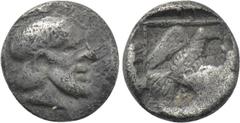 Greek Coins IONIA. Magnesia ad Maeandrum. Archepolis (Circa 459 BC). Tetartemorion. Obv: Diademed and bearded male head right. Rev: Eagle flying right within linear square border within incuse square.
