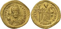 Byzantine Coins JUSTINIAN I (527-565). GOLD Solidus. Constantinople. Obv: D N IVSTINIANVS P P AVG. Helmeted and cuirassed bust facing, holding globus cruciger and shield with horseman motif. Rev: VICT