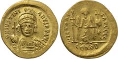 Byzantine Coins JUSTINIAN I (527-565). GOLD Solidus. Constantinople. Obv: D N IVSTINIANVS P P AVG. Helmeted and cuirassed bust facing, holding globus cruciger and shield with horseman motif. Rev: VICT