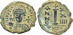 Byzantine Coins JUSTINIAN I (527-565). Decanummium. Antioch. Dated RY 24 (550/1). Obv: D N IVSTINIANVS P P AV. Helmeted and cuirassed bust facing, holding globus cruciger and shield decorated with hor