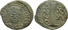 Byzantine Coins JUSTINIAN I (527-565). Decanummium. Ravenna. Dated RY 36 (562/3). Obv: D N IVSTINIANVS P P AVG. Helmeted and cuirassed bust facing, holding globus cruciger and shield decorated with ho