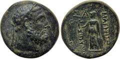 Greek Coins LYDIA. Magnesia ad Sipylum. Ae (Circa 2nd-1st centuries BC). Obv: Bare and bearded head of Herakles right. Rev: ΜΑΓΝΗΤΩΝ / ΣΙΠΥΛOY. Athena standing left, resting hand upon shield and holdi