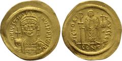 Byzantine Coins JUSTINIAN I (527-565). GOLD Solidus. Constantinople. Obv: D N IVSTINIANVS P P AVG. Helmeted and cuirassed bust facing, holding globus cruciger and shield with horseman motif. Rev: VICT