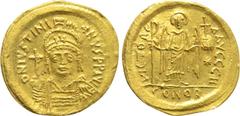 Byzantine Coins JUSTINIAN I (527-565). GOLD Solidus. Constantinople. Obv: D N IVSTINIANVS P P AVG. Helmeted and cuirassed bust facing, holding globus cruciger and shield with horseman motif. Rev: VICT