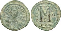 Byzantine Coins JUSTINIAN I (527-565). Follis. Constantinople. Dated RY 12 (538/9). Obv: D N IVSTINIANVS P P AVG. Helmeted, draped and cuirassed bust facing, holding globus cruciger and shield decorat