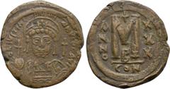 Byzantine Coins JUSTINIAN I (527-565). Follis. Constantinople. Dated RY 30 (556/7). Obv: D N IVSTINIANVS P P AVG. Helmeted, draped and cuirassed bust facing, holding globus cruciger and shield decorat