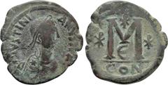Byzantine Coins JUSTINIAN (527-565). Follis. Constantinople. Obv: D N IVSTINIANVS P P AVG. Diademed, draped and cuirassed bust right, with star on shoulder. Rev: Large M; Chi-Rho to left, above and to
