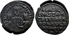 Byzantine Coins BASIL I THE MACEDONIAN, with LEO VI and CONSTANTINE (867-886). Follis. Constantinople. Obv: + LЄOҺ ЬASIL S COҺST AЧGG. Crowned facing busts of Basil between Leo and Constantine. Rev: +