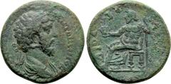 Roman Provincial Coins LYDIA. Dioshieron. Marcus Aurelius (161-180). Ae. Obv: ΑV ΚΑΙ Μ ΑVΡΗΛΙ ΑΝΤΩΝЄΙΝΟС. Laureate, draped and cuirassed bust right. Rev: ΔΙΟСΙЄΡЄΙΤΩΝ. Zeus seated left on throne, hold