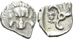 Greek Coins DYNASTS OF LYCIA. Perikles (Circa 380-360 BC). Tetrobol. Uncertain mint, possibly Phellos. Obv: Facing scalp of lion. Rev: Triskeles; in left field, laureate and draped bust of Apollo faci