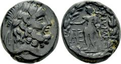 Greek Coins LYDIA. Blaundos. Ae (2nd-1st centuries BC). Obv: Laureate head of Zeus right. Rev: MΛAYNΔEωN. Hermes standing left, holding purse and kerykeion; monogram to left; all within wreath. SNG Co